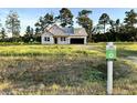 New construction home in Barker Farms community, showing lot number sign at 112 Infinity Ln., Loris, SC 29569