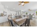 Inviting dining area with a wooden table, stylish chairs, and an open-concept layout at Lot 40 Lineback Pl. # 40, Longs, SC 29568