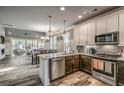 Spacious kitchen with granite countertops and stainless steel appliances at 405 N Highland Way, Myrtle Beach, SC 29572