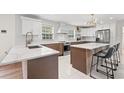 Modern kitchen featuring marble countertops and an island at 405 N Highland Way, Myrtle Beach, SC 29572