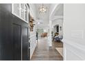 Bright entryway with hardwood floors leading to the living room at 790 Caines Landing Rd., Conway, SC 29526