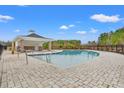 Community pool with brick pavers and a covered pavilion at 1124 Cypress Shoal Dr., Conway, SC 29526