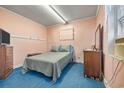 Bedroom with window, dresser and TV at 1861 Jenerette St., Mullins, SC 29574