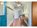 Inviting entryway with hardwood floors and half bathroom at 1861 Jenerette St., Mullins, SC 29574