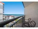 A serene balcony featuring comfortable chairs and a stunning ocean view at 7100 N Ocean Blvd. # 1023, Myrtle Beach, SC 29572