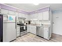 Bright kitchen with stainless steel appliances and stone countertops at 6000 N Ocean Blvd. # 330, North Myrtle Beach, SC 29582
