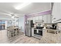 Well lit kitchen with stainless steel appliances and breakfast nook at 6000 N Ocean Blvd. # 330, North Myrtle Beach, SC 29582