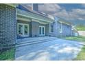 Brick patio with double doors leading to the backyard at 1437 Shoreline Dr., Myrtle Beach, SC 29577