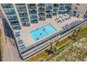 Elevated pool with multiple lounge chairs and ocean view at 2500 N Ocean Blvd. # 616, North Myrtle Beach, SC 29582