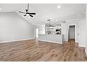 Open kitchen with island, stainless steel appliances and light-colored cabinetry at 1409 Crooked Hook Rd., North Myrtle Beach, SC 29582