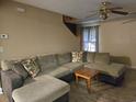 Comfortable living room with a large sectional sofa and a wooden coffee table at 938 Fox Hollow Rd., Conway, SC 29526