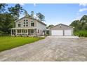 Two-story home with attached garage; spacious yard at 1270 Circle Bay Dr., Longs, SC 29568