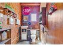 Functional bathroom space with a toilet and sink decorated with car-themed decorations at 3747 Bakers Chapel Rd., Aynor, SC 29511