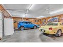 Spacious garage with room for parking and a functional workspace, great for car enthusiasts at 3747 Bakers Chapel Rd., Aynor, SC 29511