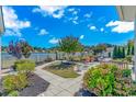 Beautiful backyard featuring a white picket fence, lush landscaping, patio and scenic views at 3412 Holly Loop, Conway, SC 29527