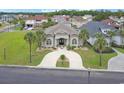 This aerial view showcases a stunning home nestled amongst mature trees in a friendly neighborhood at 202 Ave. Of The Palms, Myrtle Beach, SC 29579