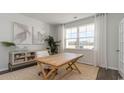 Home office with a wooden desk, neutral decor, and natural light at 308 Glade Ct., Loris, SC 29569