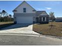 Inviting single-Gathering home with a spacious driveway, stone accents and two-car garage at 1248 Wehler Ct., Conway, SC 29526