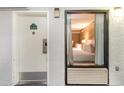 Cozy bedroom with two beds and modern amenities, as seen from the hallway at 1501 South Ocean Blvd. # 644, Myrtle Beach, SC 29577