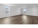 Bright and airy living room with neutral walls and vinyl flooring at 1149 Cherrystone Loop, Conway, SC 29526