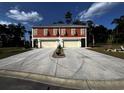 Front view of two-unit building with attached garages at 110 Hallandale Lane # Right, Murrells Inlet, SC 29576