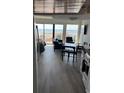 Bright living room with beach views, modern furniture, and comfortable seating at 202 70Th Ave. N # 104, Myrtle Beach, SC 29572