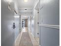 Clean condo hallway with light walls and tiled floor at 5905 South Kings Hwy. # A450, Myrtle Beach, SC 29575