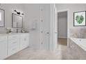 Bright bathroom featuring double vanity, stylish fixtures, and ample counter space at 293 Waterfall Circle, Little River, SC 29566