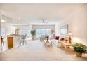 Bright and airy living room featuring neutral walls, carpet flooring, and an open floor plan at 812 Lalton Dr., Conway, SC 29526