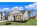 Well-maintained single Gathering home with pristine landscaping and beautiful architectural details at 5032 Cambria Ct., Little River, SC 29566