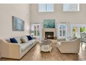 Inviting living room featuring a fireplace, comfortable seating, and plenty of natural light at 1002 Summers Pl., North Myrtle Beach, SC 29582