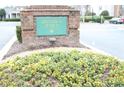 Community sign for Broadway Station featuring a brick base and manicured flower beds at 3762 Citation Way # 1016, Myrtle Beach, SC 29577