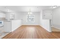 Simple dining area with wood floors and kitchen access at 117 Butkus Dr. # 3, Myrtle Beach, SC 29588