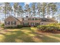 Beautiful two-story brick home with well-maintained lawn and mature landscaping at 2807 Graham Rd., Conway, SC 29526