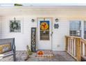 Inviting front porch with a wreath and welcome sign at 1412 Hemingway St., Myrtle Beach, SC 29577