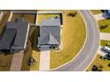 An aerial view of a home showcasing its location on a corner lot in a residential neighborhood at 263 Red Maple Loop, Longs, SC 29568