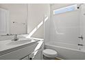 Bright bathroom showcasing a tub-shower combination and a single sink vanity at 299 Hayloft Circle, Conway, SC 29526