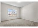 Clean and bright bedroom featuring neutral carpet and a window with a view at 299 Hayloft Circle, Conway, SC 29526
