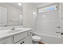 Clean bathroom with a bathtub, toilet, and vanity with a mirror at 902 Owls Nest Dr., Conway, SC 29527