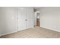 Spacious bedroom with neutral walls and carpet flooring, including a double-door closet at 902 Owls Nest Dr., Conway, SC 29527