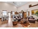 Spacious living room with high ceilings, hardwood floors, and rustic decor at 7299 Cartrette Rd., Aynor, SC 29511