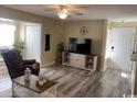 Living room with grey flooring and comfy seating at 2268 Essex Dr. # G, Surfside Beach, SC 29575