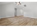 Open-concept living area featuring hardwood flooring and abundant natural light at 608 Britt St., Georgetown, SC 29440