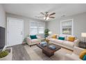 Bright living room with comfy sofas, coffee table, and wood-look floors at 1610 Wright Blvd., Conway, SC 29527