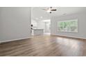 Spacious living room featuring vinyl plank flooring and an open floor plan at 387 Lifestyle Court, Surfside Beach, SC 29575