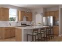 Beautiful kitchen with stainless steel appliances, ample counter space, and modern pendant lighting at 4009 Braid Ct., Myrtle Beach, SC 29588