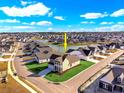 An aerial shot of a home near a pond in a planned community on a sunny day at 5015 Cambria Ct., Little River, SC 29566