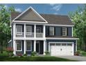 Charming two-story home with a large front-facing garage and second story balcony at 5015 Cambria Ct., Little River, SC 29566