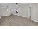 Open-concept living room with wood floors and recessed lighting at 627 Bonaventure Dr. # 202, Myrtle Beach, SC 29577