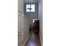 Inviting hallway with hardwood floors and a view to the living area at 1060 Fairway Ln. # 1060, Conway, SC 29526